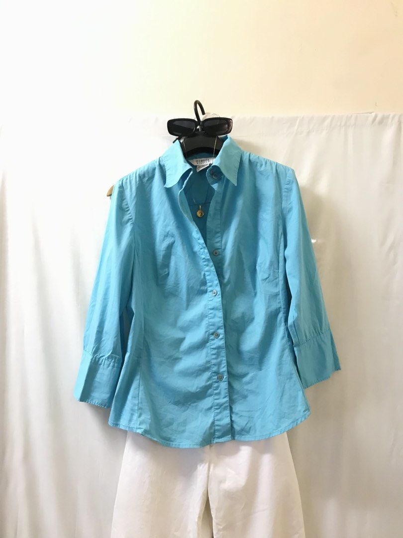 Ocean blue buttondown polo (Category: Blouses) located in Manila. Submitted by 414studio (Listing ID 1468043174, Image 2). Description: medium Good quality In good condition (Scarf and accessories are not included) .