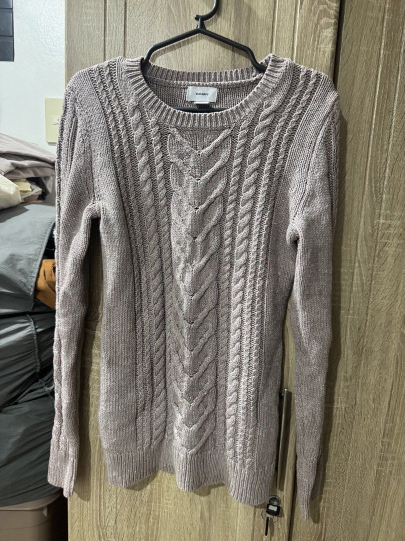 Old Navy cable knit sweater pink mauve glitter (Category: Coats, Jackets and Outerwear) located in Baras. Submitted by vale831 (Listing ID 1468024183, Image 1). Description: - Brand: Old Navy - Style: Classic cable knit sweater with subtle metallic sparkle - Color: Dusty pink / mauve - Details: Crew neckline, long sleeves, ribbed collar, cuffs, and hem - Material: Soft and comfortable knit fabric - Condition: Great for layering on cooler days!.