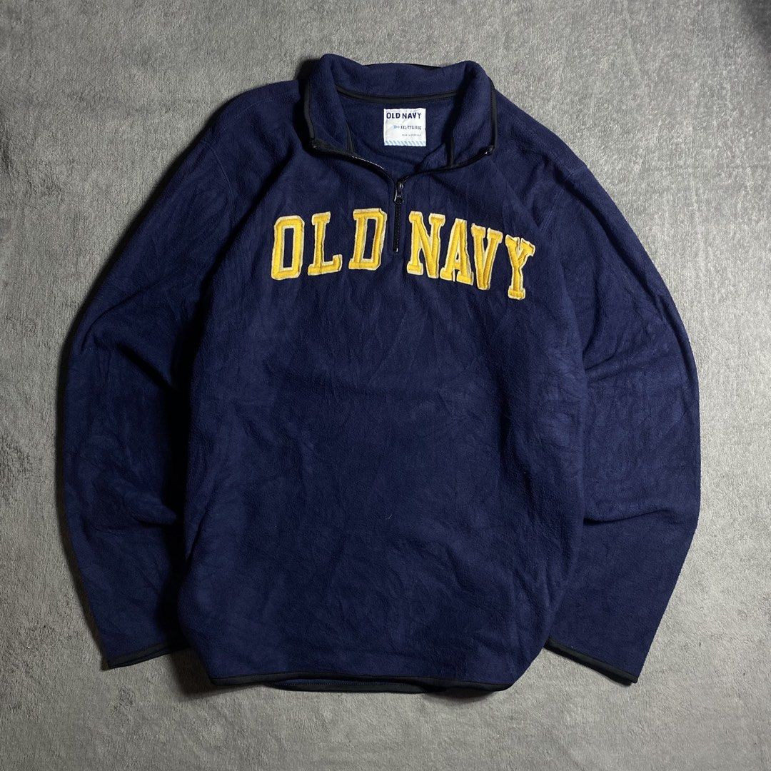 Old Navy Navy Blue Quarter Zip Fleece Pullover (Category: Coats, Jackets and Outerwear) located in Manila. Submitted by thrifturfit_star (Listing ID 1467847235, Image 1). Description: - Brand/Model: Old Navy Fleece Pullover - Size: XXL (Relaxed fit) - Color/Design: Navy blue with yellow embroidered block lettering - Details: Quarter-zip collar with black trim on edges and cuffs - Material: Super soft and warm, perfect for cooler days - Condition: