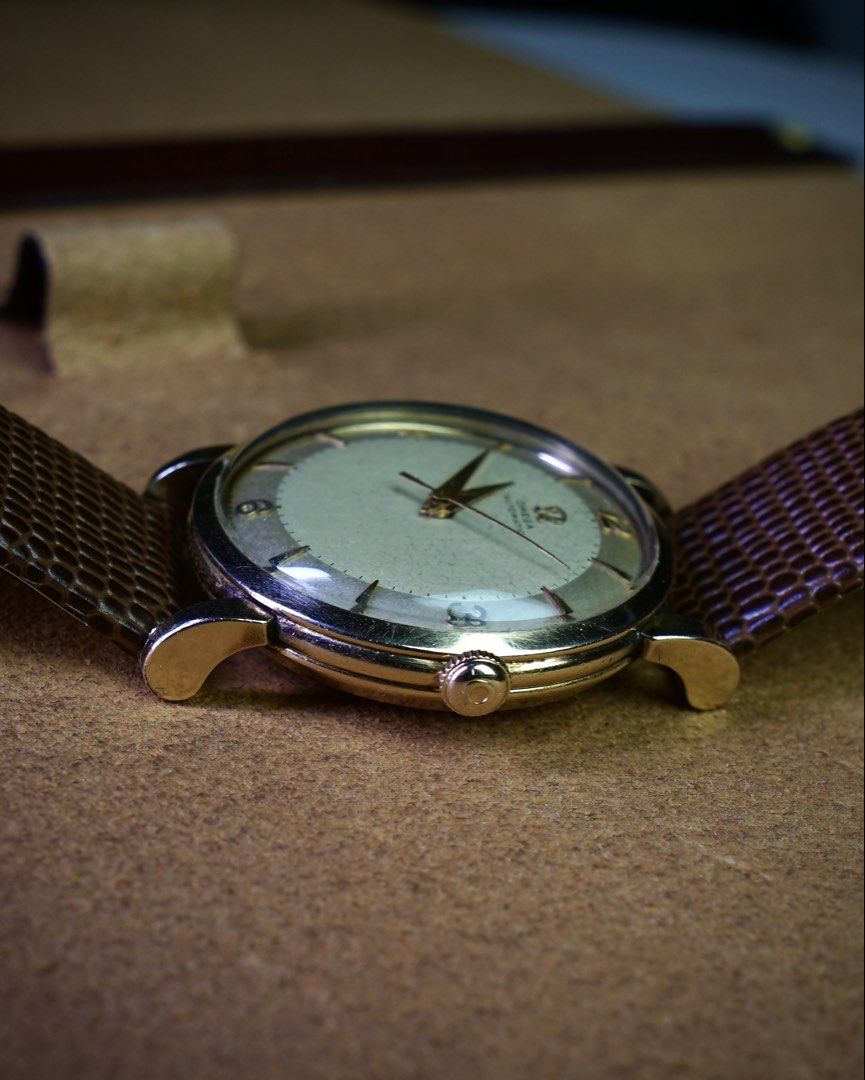 Omega Automatic Vintage Watch - 1952 (Category: Men's Watches) located in Mandaluyong City. Submitted by watchcraftph (Listing ID 1468029056, Image 3). Description: ❗️For Sale ❗️ [ON HAND] Omega Automatic Vintage Watch - 1952 Reference: C2445-7SC Year: 1952 Genuine Pre-owned Vintage Watch Spec Sheet: ✔️32.2mm 80 microns gold case ✔️39.5mm lug to lug ✔️Omega cal 351 bumper movement ✔️Omega leather strap ✔️Swiss Made Watch and hard shell case box D