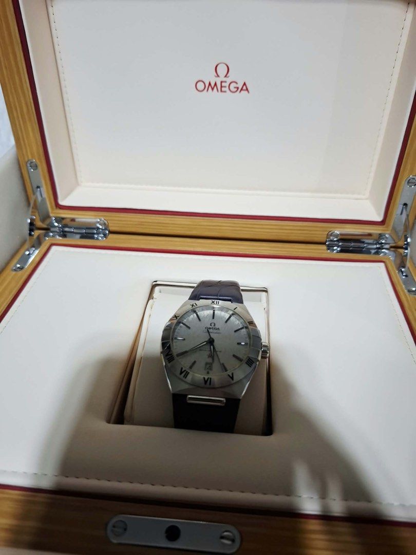 OMEGA Constellation Master Co-Axial Watch (Category: Luxury Watches) located in Manila. Submitted by piafandino36139 (Listing ID 1468026207, Image 3). Description: Omega Constellation Reference Number 131.13.39.20.06.001 Case Diameter 39 mm Case Material 316L Stainless Steel Bezel Stainless steel with blackened Roman numerals Dial Color & Finish Rhodium-grey with a unique silk-embossed pattern Hands & Markers Blackened hands, Omega logo, Constell