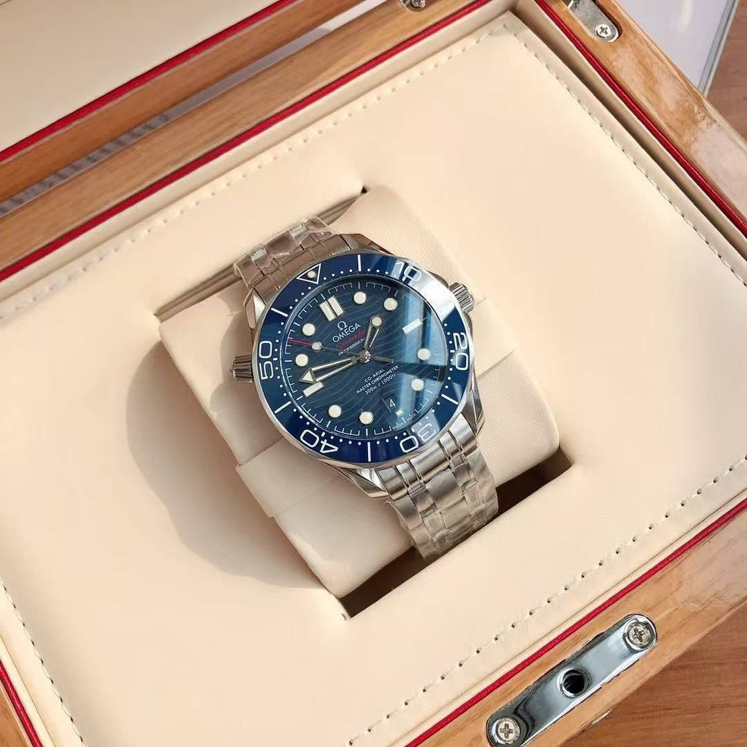 Omega Seamaster Diver 300M Blue Dial Watch (Category: Men's Watches) located in Malabon City. Submitted by ojaswibent53454 (Listing ID 1467908396, Image 1). Description: - Brand new, untouched condition (still wrapped in protective plastic straight from the wooden presentation box) - Iconic blue wave dial with matching blue bezel - Durable stainless steel case and matching steel bracelet - Reliable Swiss automatic movement with visible exhibition