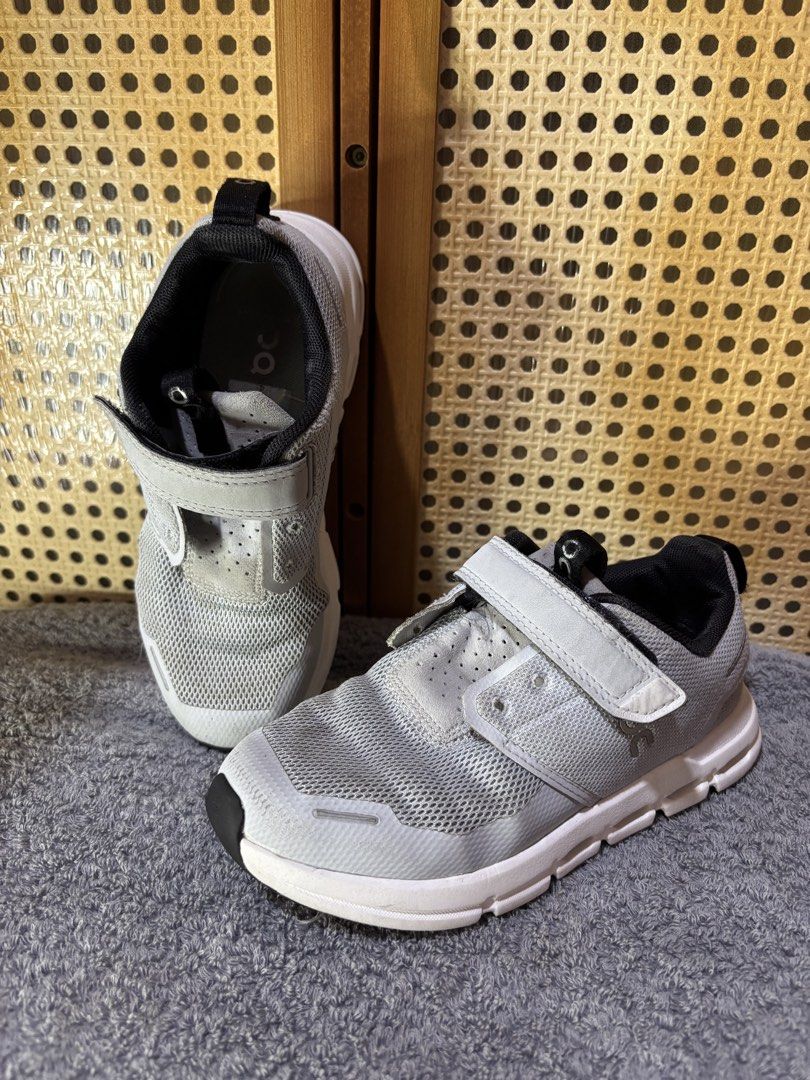 On Cloud Grey Kids Sneakers Velcro (Category: Babies & Kids Fashion) located in Manila. Submitted by wardrobeinmnl (Listing ID 1467894158, Image 1). Description: Size: 18.4cm - Brand: On Cloud Kids Sneakers - Color: Grey and white with black collar lining - Closure: Easy velcro strap for quick on and off - Comfort: Breathable mesh upper and cushioned white sole .