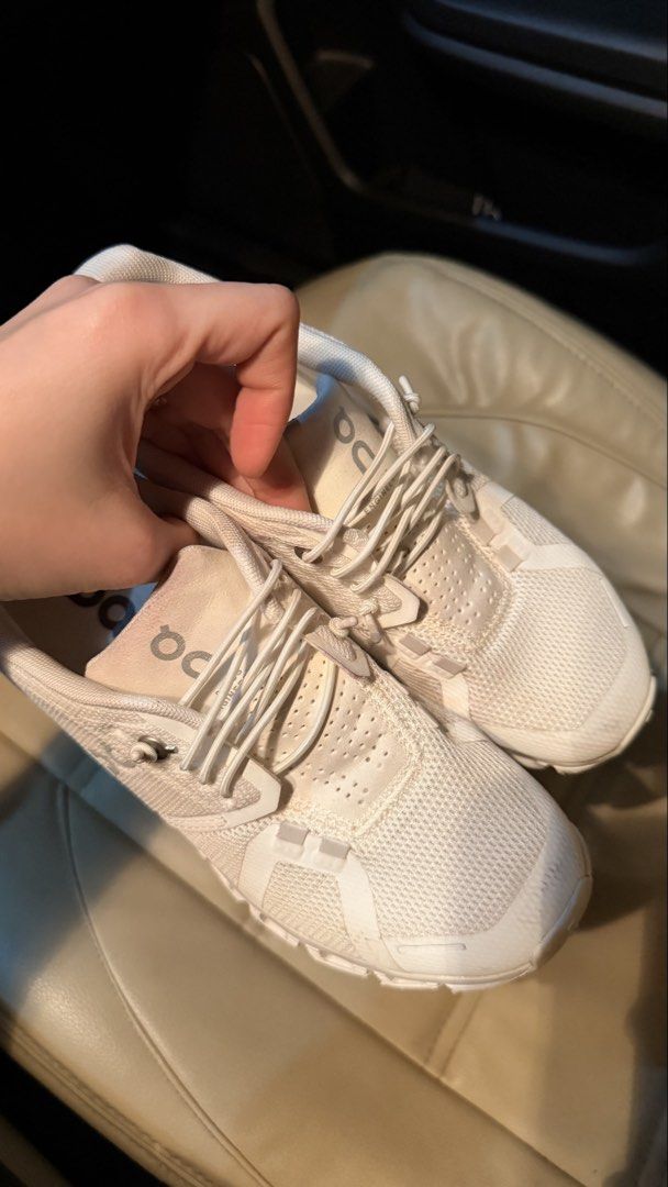 On Cloud Running Shoes All White (Category: Sneakers) located in Manila. Submitted by felicavestis (Listing ID 1467978842, Image 2). Description: - Model: On Cloud Sneakers - Colorway: All-White - Features: Signature cloud tech sole, speed-lacing system, lightweight mesh upper, and Swiss engineering details - Best For: Comfortable everyday walking and running - Condition: Minor wear on the uppers from regular use.