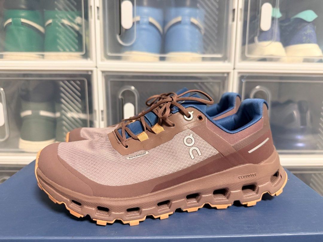 On Cloud Waterproof Trail Running Shoes (Category: Sneakers) located in Quezon City. Submitted by 30somethingtreasures (Listing ID 1467984650, Image 1). Description: - Waterproof design suitable for all weather - Chic mauve and brown colorway with vibrant blue tongue and collar accents - Chunky tread soles for maximum grip on trails - Clean, unworn mesh upper with neatly tied laces - Carefully stored indoors.