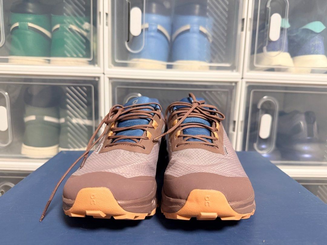 On Cloud Waterproof Trail Running Shoes (Category: Sneakers) located in Quezon City. Submitted by 30somethingtreasures (Listing ID 1467984650, Image 2). Description: - Waterproof design suitable for all weather - Chic mauve and brown colorway with vibrant blue tongue and collar accents - Chunky tread soles for maximum grip on trails - Clean, unworn mesh upper with neatly tied laces - Carefully stored indoors.