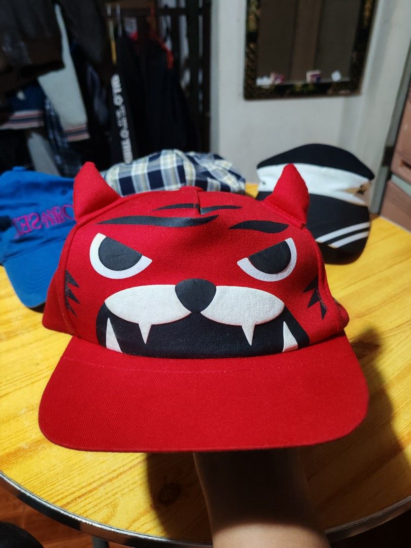 One Korea Red Tiger Monster Horn Snapback Cap (Category: Caps & Hats) located in Caloocan City. Submitted by calmfish.aae475 (Listing ID 1467991737, Image 1). Description: Club-59 Snapback cap. Made in korea. w/minor issue. Pm lng po..