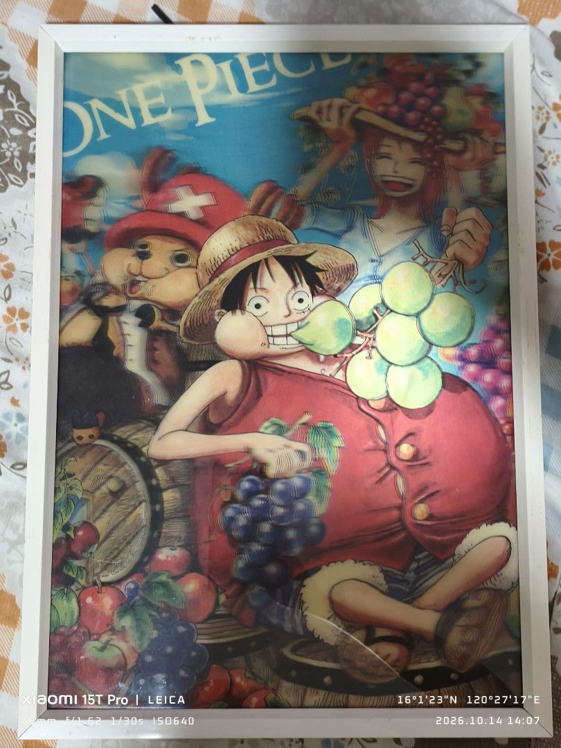 One Piece Anime Framed Poster Luffy Nami Chopper (Category: Art & Prints) located in Mapandan. Submitted by marc.bno (Listing ID 1467890357, Image 1). Description: - Design: One Piece anime art print featuring Luffy eating grapes with Nami and Chopper - Frame: Includes a clean white frame - Ready to Hang: Comes with a built-in hanging string on the back panel for easy wall mounting - Condition: Brand new and ready for display.