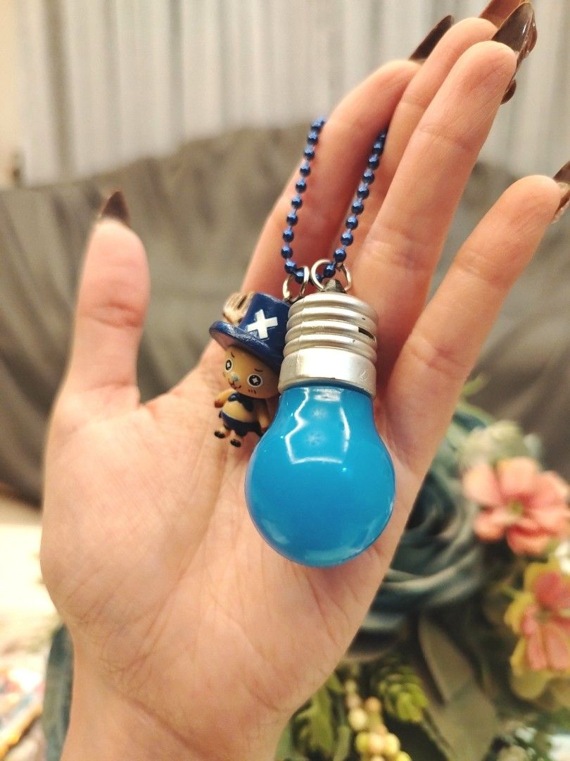 One Piece Chopper Light Bulb Keychain Charm (Category: Character Goods) located in San Fernando. Submitted by jpmarketplace2023 (Listing ID 1467919758, Image 2). Description: 💚 All items are authentic from Japan. 💛 MOP: GCash (❌️ GCash Protect) 🩵 MOD: LBC only (❌️ S. Checkout, COD, COP) 💙 Meet-up: Vista Mall, San Fernando, Pampanga 💜 All items are on-hand. 🧡 First to pay gets the item first. ❤️ Breakable items are packed with care and cauti