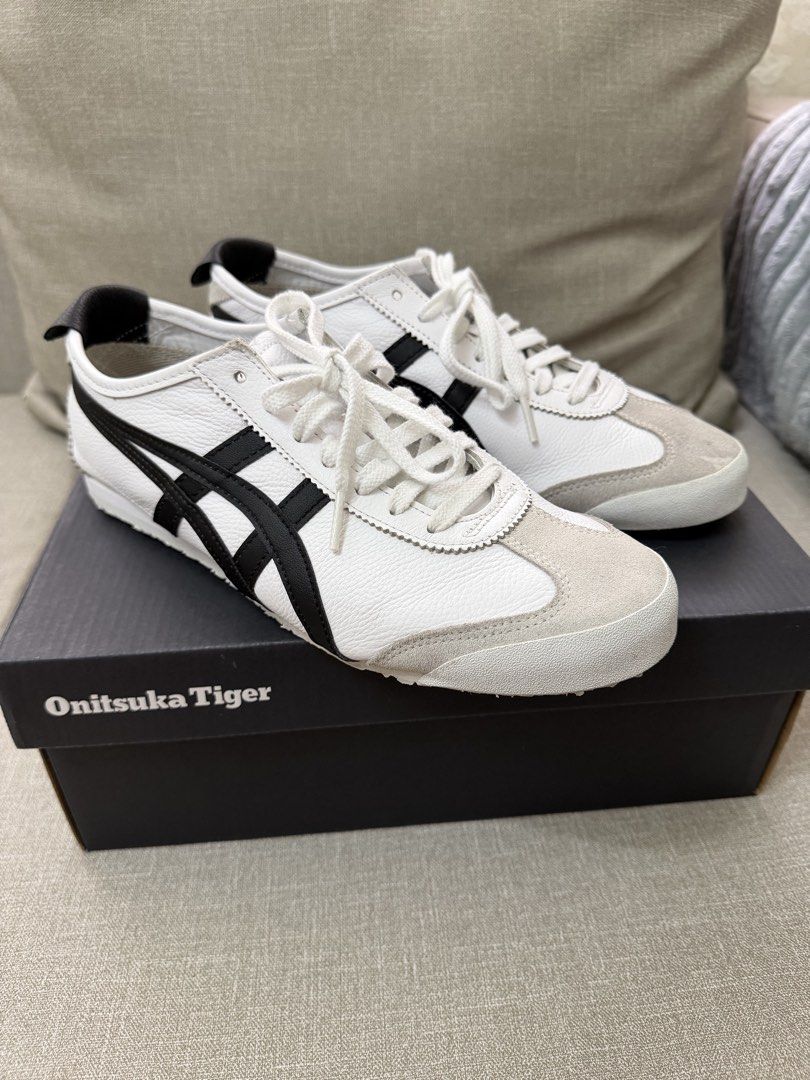 Onitsuka Tiger Mexico 66 SD White Black (Category: Sneakers) located in Quezon City. Submitted by babybubots (Listing ID 1467921595, Image 1). Description: - Brand: Onitsuka Tiger - Color: White with black stripes and grey suede overlays - Size: US 8 Mens / US 9.5 Womens - Condition: Worn 3x only but selling because I got the wrong size - Inclusions: Comes with original branded shoebox - Authentic; From Japan MOP: Gcash, Maya, RCBC MOD: Lalamove 