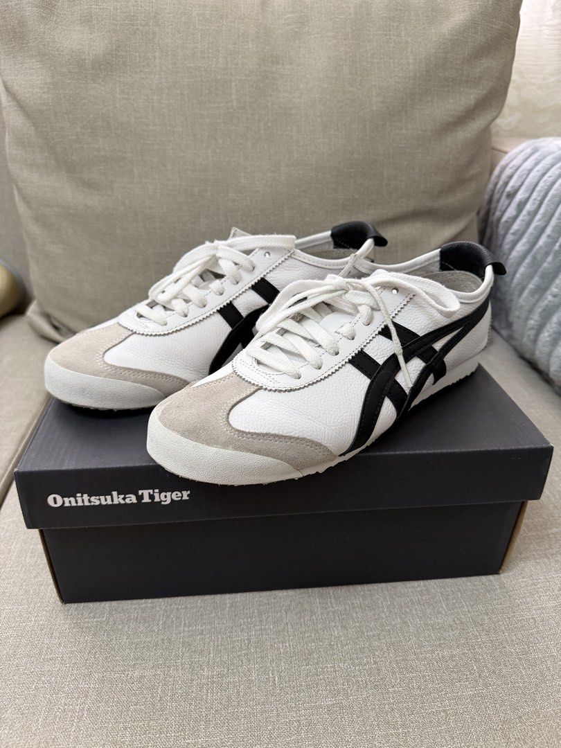 Onitsuka Tiger Mexico 66 SD White Black (Category: Sneakers) located in Quezon City. Submitted by babybubots (Listing ID 1467921595, Image 2). Description: - Brand: Onitsuka Tiger - Color: White with black stripes and grey suede overlays - Size: US 8 Mens / US 9.5 Womens - Condition: Worn 3x only but selling because I got the wrong size - Inclusions: Comes with original branded shoebox - Authentic; From Japan MOP: Gcash, Maya, RCBC MOD: Lalamove 