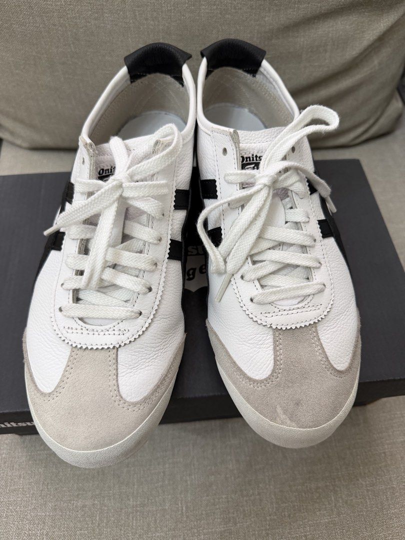 Onitsuka Tiger Mexico 66 SD White Black (Category: Sneakers) located in Quezon City. Submitted by babybubots (Listing ID 1467921595, Image 3). Description: - Brand: Onitsuka Tiger - Color: White with black stripes and grey suede overlays - Size: US 8 Mens / US 9.5 Womens - Condition: Worn 3x only but selling because I got the wrong size - Inclusions: Comes with original branded shoebox - Authentic; From Japan MOP: Gcash, Maya, RCBC MOD: Lalamove 