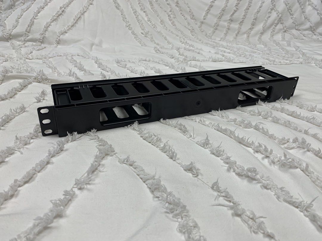 Optronics 19 Inch Professional Rack Mount Horizontal Cable Manager for Network Server or Audio Video Equipment (Category: Cables & Adaptors) located in Paranaque City. Submitted by seb_trading (Listing ID 1467886326, Image 1). Description: Clearance Sale: while supply last - Brand: Optronics Australia - Size: 19-inch standard rack mount - Material: Durable black plastic build - Design: Slots along top and back for easy routing of patch cables, au
