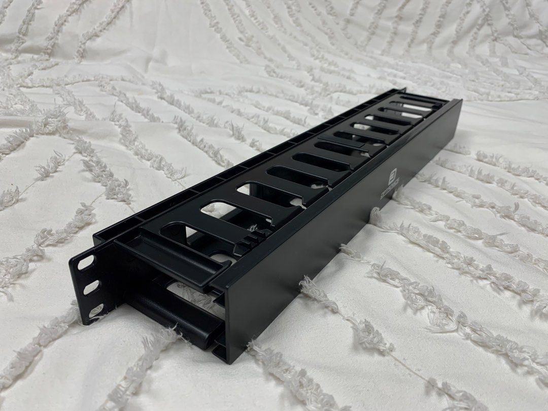 Optronics 19 Inch Professional Rack Mount Horizontal Cable Manager for Network Server or Audio Video Equipment (Category: Cables & Adaptors) located in Paranaque City. Submitted by seb_trading (Listing ID 1467886326, Image 3). Description: Clearance Sale: while supply last - Brand: Optronics Australia - Size: 19-inch standard rack mount - Material: Durable black plastic build - Design: Slots along top and back for easy routing of patch cables, au