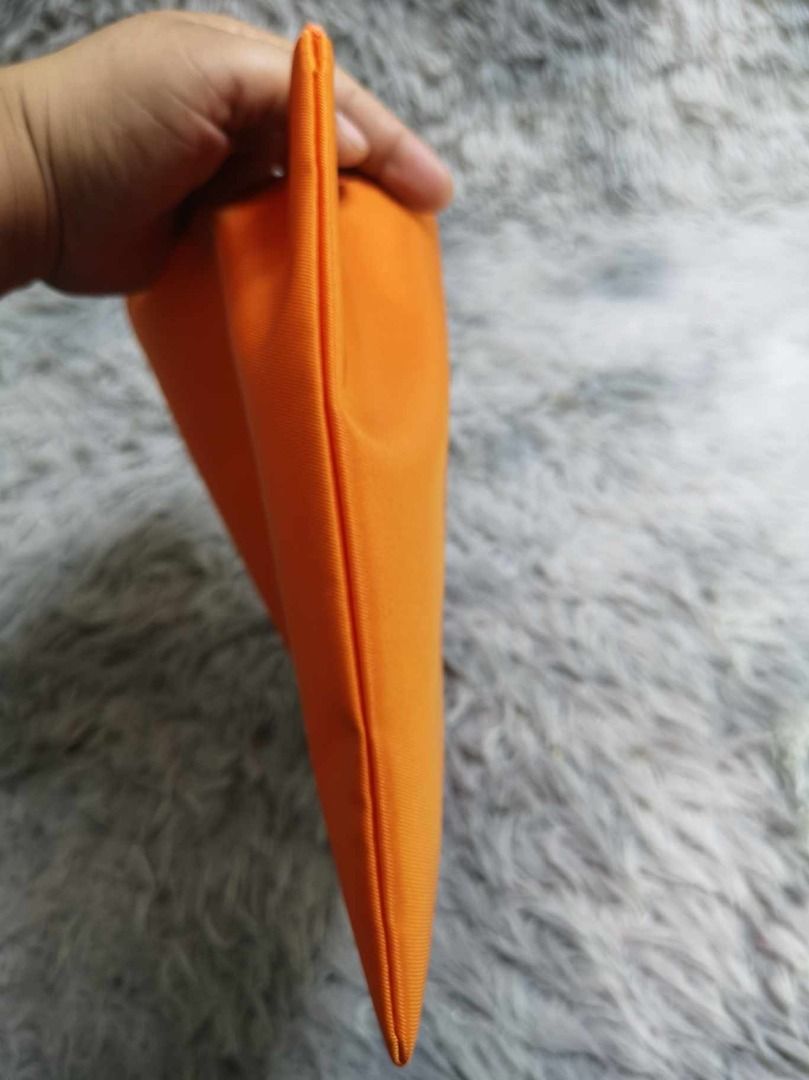 Orange Rectangular Zippered Pouch (Category: Purses & Pouches) located in Santa Cruz. Submitted by jmy_surplus.2 (Listing ID 1467916892, Image 3). Description: Size ; L - 10 W - 11.6 Color ; Orange Type ; Pouch Brand ; No brand Material ; Nylon Style ; Zipper Closure rectangular Pouch LG 117 JMY 3 Batch #225.