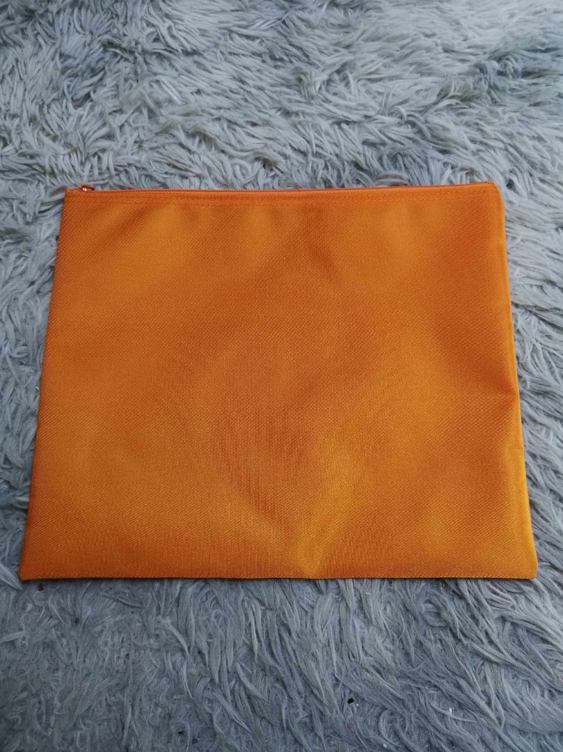 Orange Rectangular Zippered Pouch (Category: Purses & Pouches) located in Santa Cruz. Submitted by jmy_surplus.2 (Listing ID 1467916892, Image 2). Description: Size ; L - 10 W - 11.6 Color ; Orange Type ; Pouch Brand ; No brand Material ; Nylon Style ; Zipper Closure rectangular Pouch LG 117 JMY 3 Batch #225.