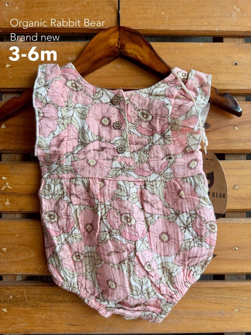 Organic Rabbit Bear Baby Romper Floral (Category: Babies & Kids Fashion) located in Santa Rosa. Submitted by yasss23 (Listing ID 1467983196, Image 3). Description: - Brand new with original tag attached - Made from super soft, organic material gentle on baby skin - Adorable sweet pink floral print with cute ruffle sleeves - Convenient button closure at the back - Bottom snaps for quick and easy diaper changes.