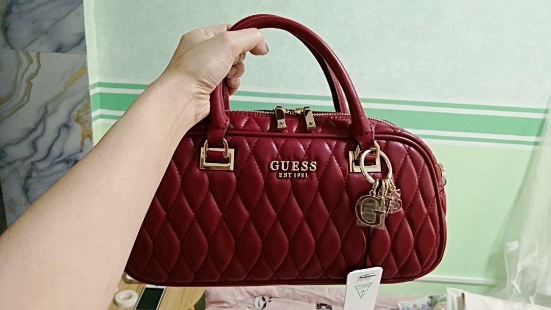 Original guess bag from korea (Category: Luxury Bags & Wallets) located in Manila. Submitted by onsbyrg_88 (Listing ID 1467906997, Image 1). Description: Brand new original guess bag red color.