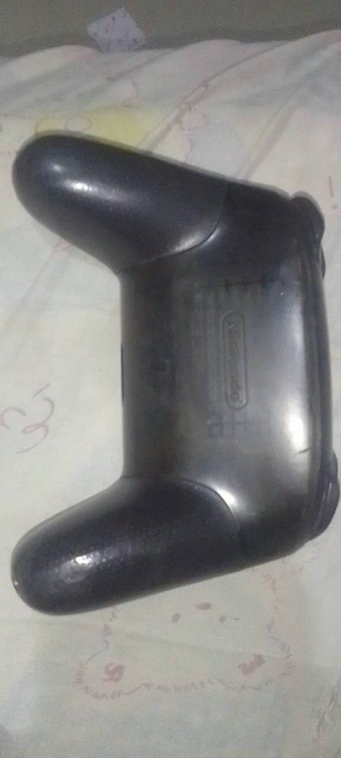 Original Nintendo Switch Pro Controller (Defective / For Parts Only) (Category: Controllers) located in Binangonan. Submitted by khulet013 (Listing ID 1467946492, Image 2). Description: Original Nintendo Switch Pro Controller (Defective / For Parts Only).