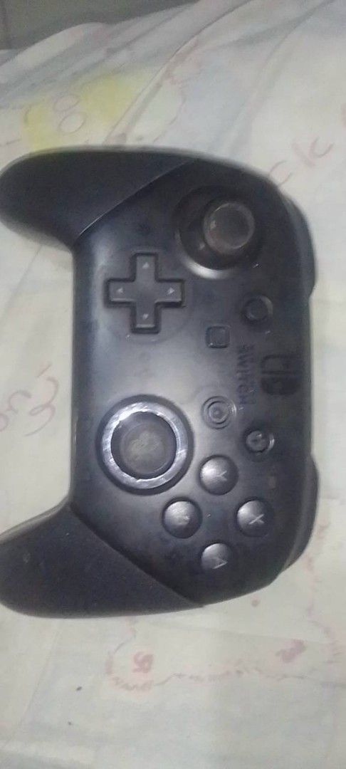 Original Nintendo Switch Pro Controller (Defective / For Parts Only) (Category: Controllers) located in Binangonan. Submitted by khulet013 (Listing ID 1467946492, Image 1). Description: Original Nintendo Switch Pro Controller (Defective / For Parts Only).