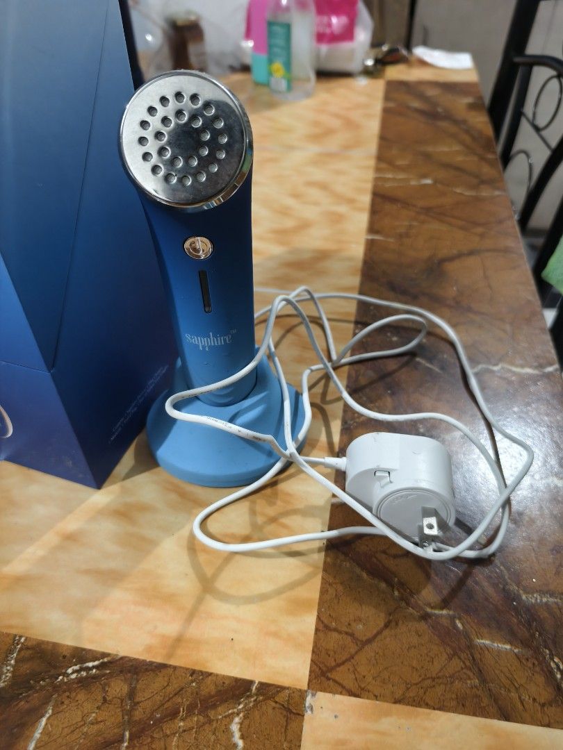 Original Sapphire by Zero Gravity Facial Device (Category: Face Care) located in Caloocan City. Submitted by kerrigan123 (Listing ID 1468033030, Image 3). Description: RUSH SALE: Original Sapphire by Zero Gravity Facial Device 💙 Like new — barely used! Selling my Sapphire facial treatment device. Complete set with original box, charger, and stand. ✅ Excellent condition ✅ Barely used ✅ Complete accessories ✅ Ideal for at-home blue-light acne trea
