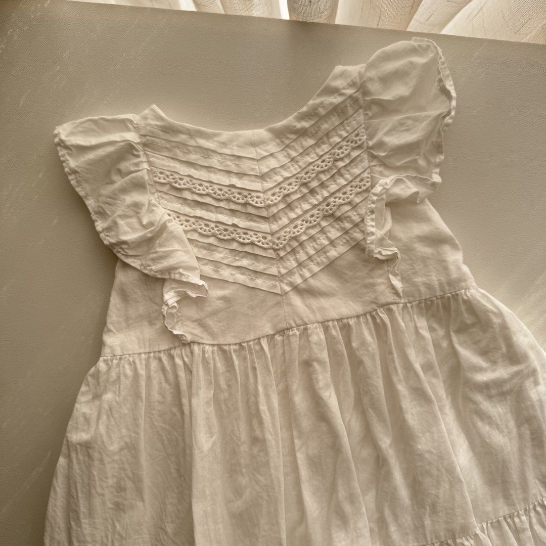 Oshkosh White Dress (Category: Babies & Kids Fashion) located in Pasay City. Submitted by littlebebekidsstuff (Listing ID 1467854626, Image 2). Description: Size: 18m on tag.