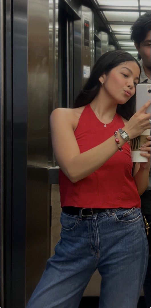 Out & About MNL Red Linen Halter Top (Category: Sleeveless) located in Quezon City. Submitted by prelovedbynxkole (Listing ID 1467884871, Image 3). Description: - Brand: Out & About MNL - Color: Bright red - Style: Halter top with adjustable back-of-neck ties and slightly curved hem - Material: Lightweight fabric - Condition: Worn once, washed, and ready to wear - Perfect for adding a pop of color to daytime outfits ALL CLOTHES NEED TO BE WASHED 