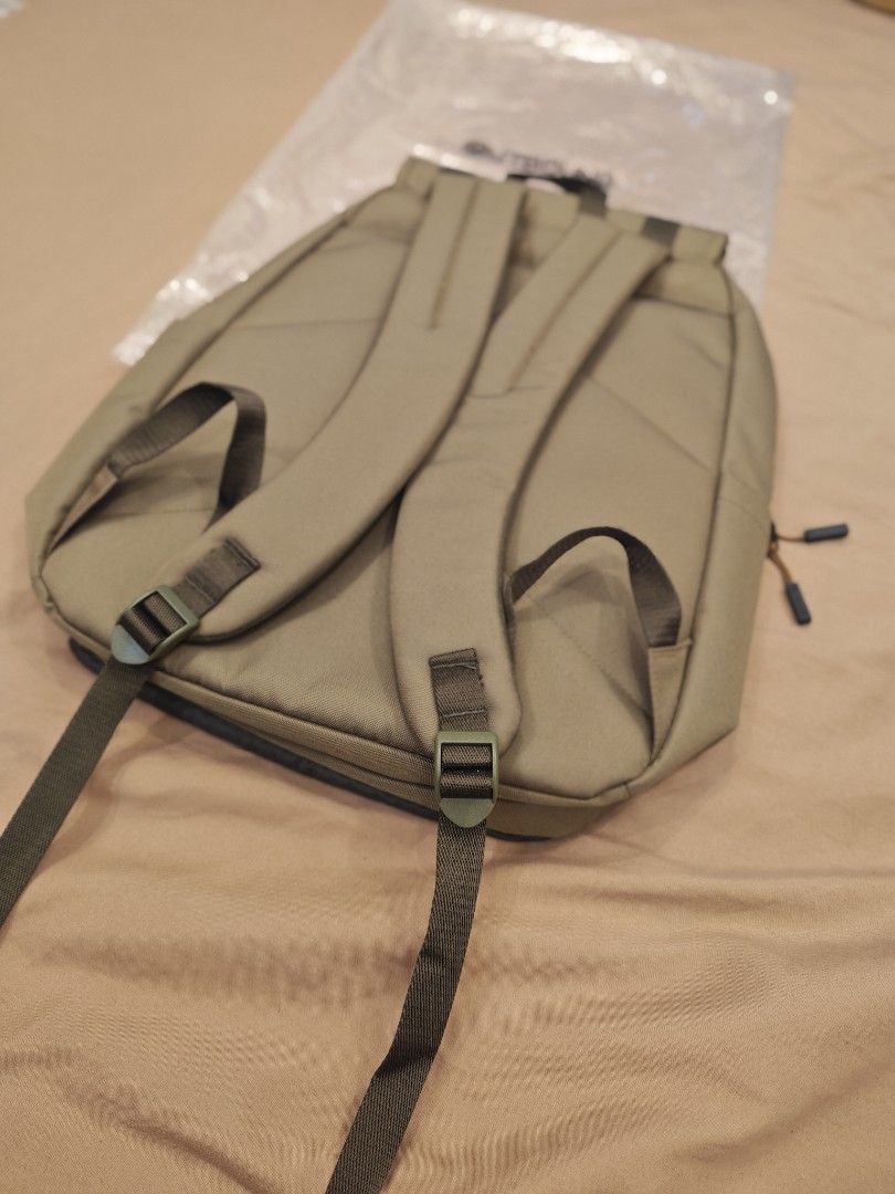 Outbound Green Canvas Backpack with Brown Leather Details (Category: Backpacks) located in Malabon City. Submitted by neon.neon2 (Listing ID 1468044776, Image 3). Description: - Brand: Outbound - Color: Olive green canvas with dark green bottom panel - Closure: Dual buckle flap over main compartment - Pockets: Front zipped pocket and convenient side pockets - Comfort: Padded shoulder straps with adjustable buckles - Details: Front brand logo patc