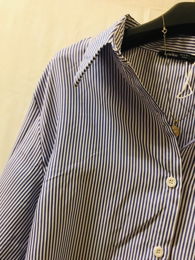 Oversized stripes buttondown light blue (Category: Blouses) located in Manila. Submitted by 414studio (Listing ID 1468044399, Image 3). Description: Free size Good quality In good condition (Scarf and accessories are not included) .