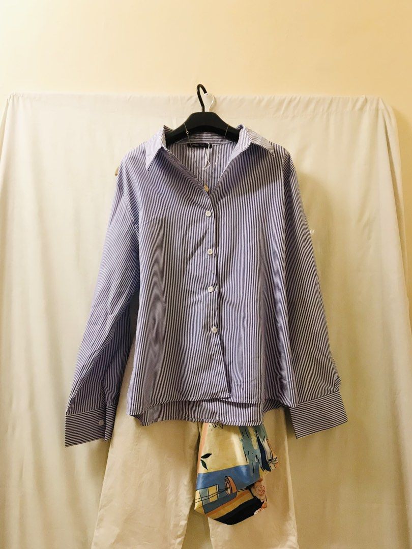 Oversized stripes buttondown light blue (Category: Blouses) located in Manila. Submitted by 414studio (Listing ID 1468044399, Image 1). Description: Free size Good quality In good condition (Scarf and accessories are not included) .