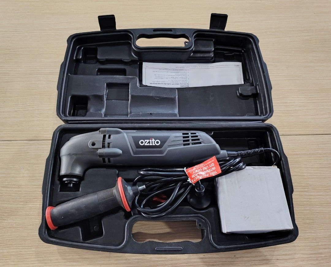Ozito Multi Tool w/ Case (Category: Construction Tools & Equipment) located in Manila. Submitted by rollysuela09206 (Listing ID 1467878590, Image 1). Description: - Brand: Ozito - MFR-2200 - Multi Tool Set - Power Source: Corded electric - Ready to plug and use) - Condition: Complete set in fitted plastic storage case - Included Accessories: Main power tool, auxiliary handle, hex key, manual, and carry case - Blades & Attachments: Various saw bla