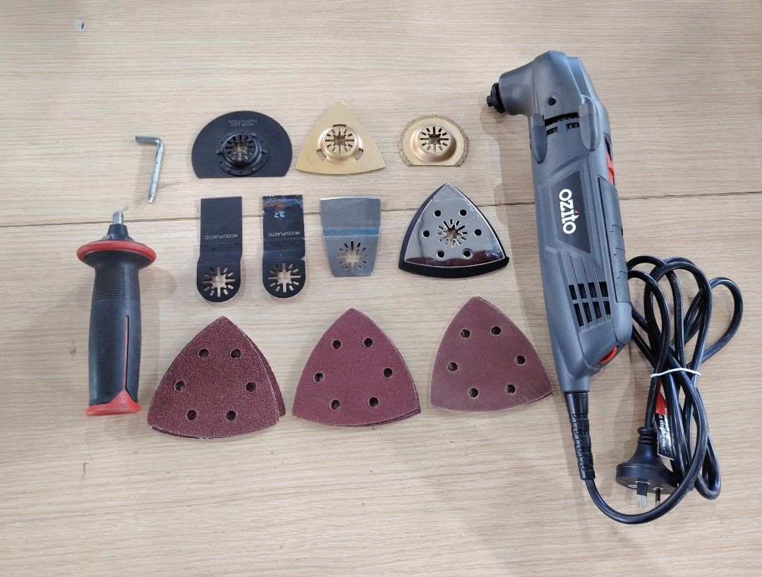 Ozito Multi Tool w/ Case (Category: Construction Tools & Equipment) located in Manila. Submitted by rollysuela09206 (Listing ID 1467878590, Image 2). Description: - Brand: Ozito - MFR-2200 - Multi Tool Set - Power Source: Corded electric - Ready to plug and use) - Condition: Complete set in fitted plastic storage case - Included Accessories: Main power tool, auxiliary handle, hex key, manual, and carry case - Blades & Attachments: Various saw bla