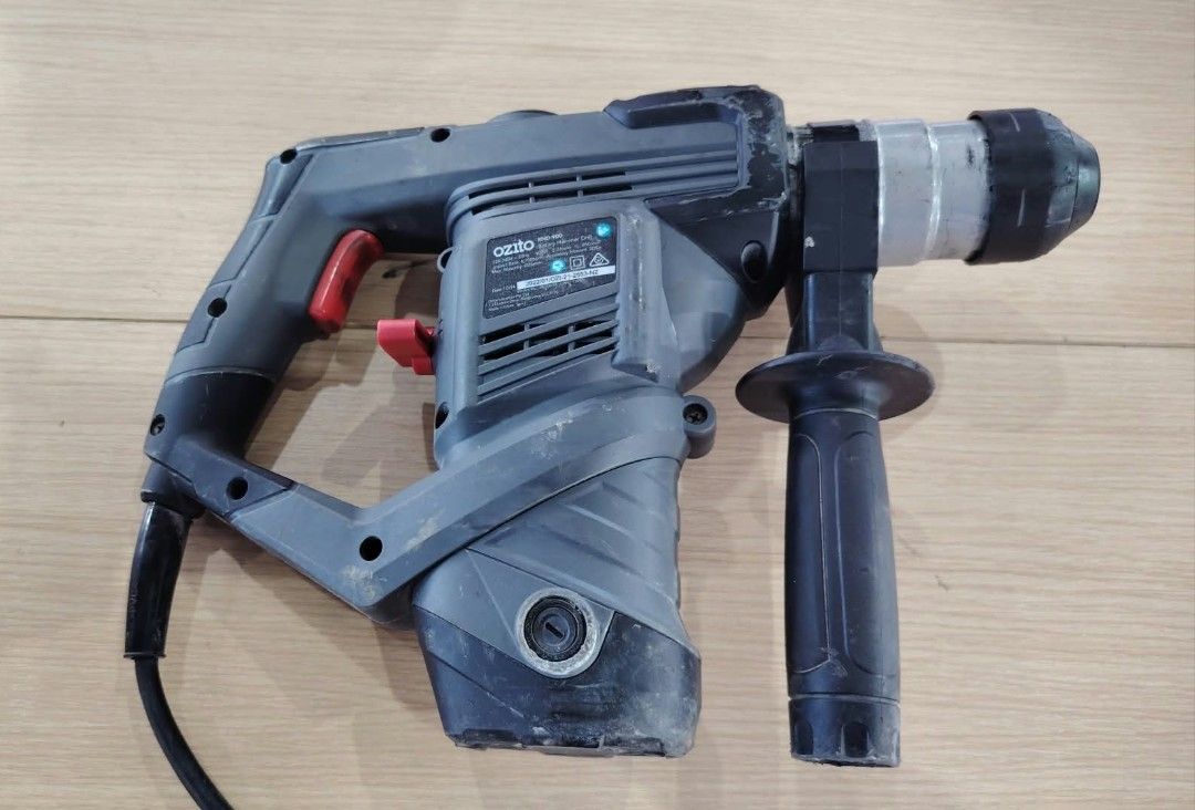 Ozito Rotary Hammer Drill (Category: Construction Tools & Equipment) located in Manila. Submitted by rollysuela09206 (Listing ID 1467857237, Image 2). Description: - Brand : Ozito - Model : RHD-900 - Rotary Hammer Drill without Drill Bits - Type: Heavy-duty corded power tool - with handle - Condition: Fully working, Used As Is - Important : Always switch off the tool before changing modes - Perfect for heavy drilling and DIY projects.
