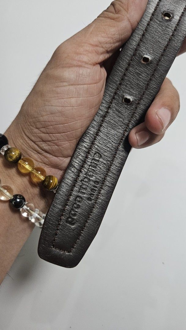 Paco Rabanne Leather Belt (Category: Belts) located in Alfonso. Submitted by jbcamet (Listing ID 1467980512, Image 3). Description: - Brand: Paco Rabanne - Condition: Brand new with original store tag attached - Material: 100% genuine cowhide leather - Color: Rich burgundy - Hardware: Silver-tone metal buckle with engraved branding - Design: Detailed stitching pattern along the strap with classic styling - Versatility: Great accessory for both fo