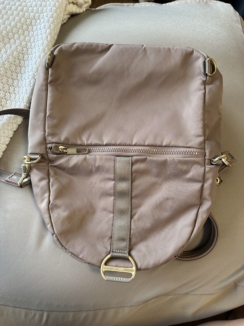 Pacsafe anti-theft convertible backpack (Category: Backpacks) located in Taguig. Submitted by kathleen.tan (Listing ID 1467928973, Image 3). Description: Can check the close up photos for minor stains and clearly used hardware. Other than those its very clean. .