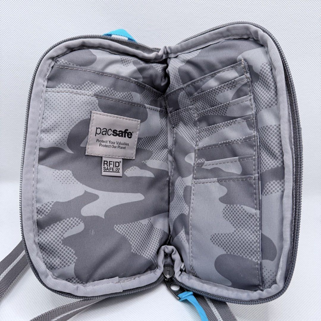 Pacsafe Orig Sling Wallet (Category: Wallets & Card holders) located in Quezon City. Submitted by ajandstevenshopscorner (Listing ID 1467914376, Image 2). Description: In excellent condition Fix price Pass sa barat.