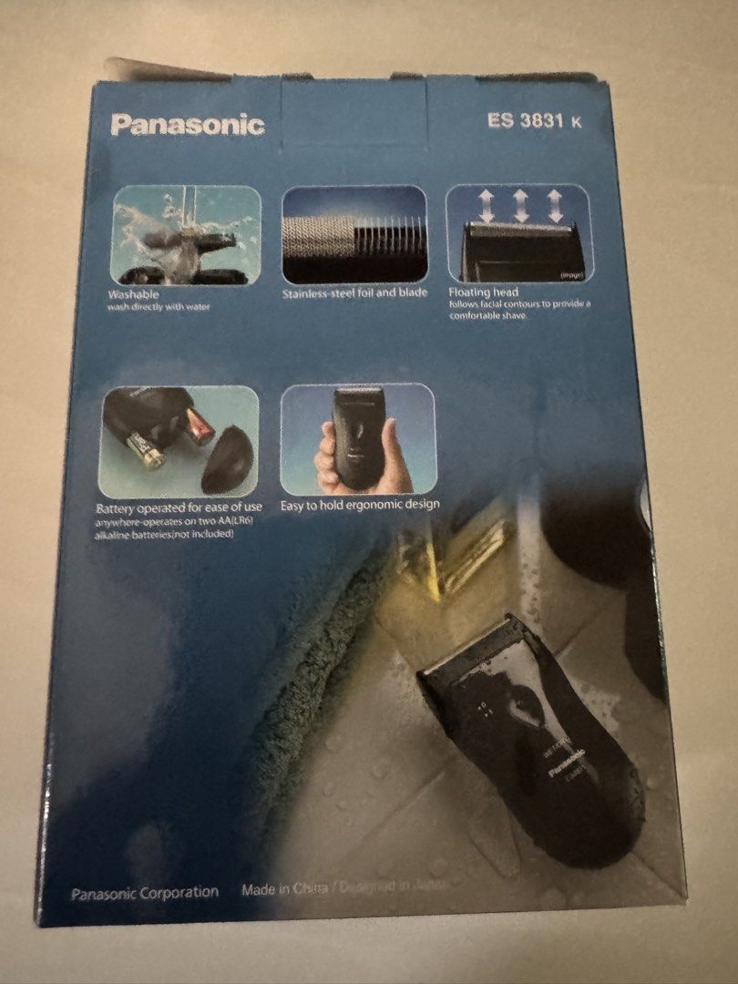 Panasonic ES3831K Compact Wet/Dry Shaver (Category: Men's Grooming) located in Manila. Submitted by xenasales (Listing ID 1467865780, Image 2). Description: - Model: Panasonic ES3831K Wet and Dry Shaver - Power: Runs on 2 AA batteries for easy portability - Blades: Stainless steel foil and blade for a clean shave - Design: Ergonomic handle with a floating head that follows facial contours - Maintenance: Fully washable under water - Inclusions: Co