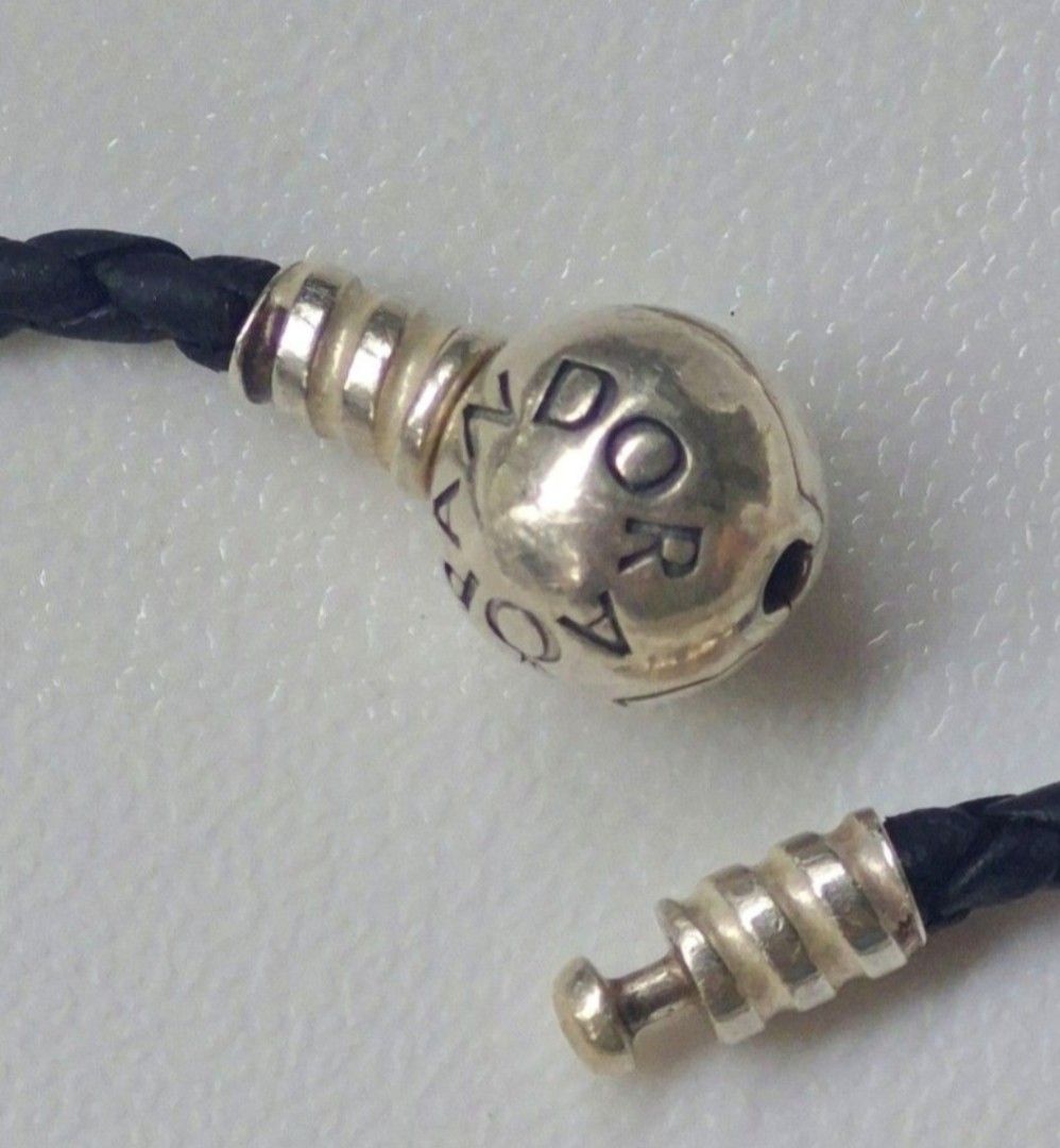 Pandora Moments Double Black Leather Bracelet (Category: Bracelets) located in Imus. Submitted by epicfish.829b4c (Listing ID 1467931024, Image 2). Description: - 100% Genuine Pandora bracelet - Black braided double leather strap for a chic look - Sterling silver ball clasp with engraved Pandora logo - Secure snap closure for all-day wear - Versatile minimalist style Imus Cavite.