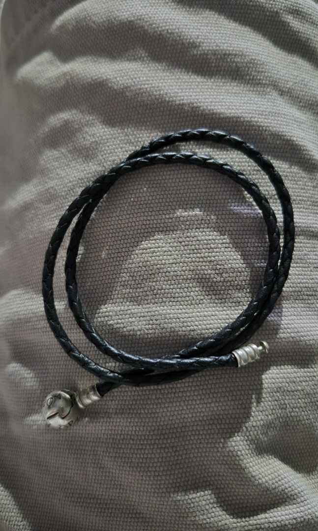 Pandora Moments Double Black Leather Bracelet (Category: Bracelets) located in Imus. Submitted by epicfish.829b4c (Listing ID 1467931024, Image 1). Description: - 100% Genuine Pandora bracelet - Black braided double leather strap for a chic look - Sterling silver ball clasp with engraved Pandora logo - Secure snap closure for all-day wear - Versatile minimalist style Imus Cavite.