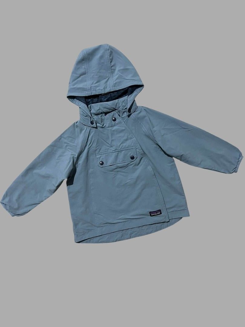 Patagonia Toddler Jacket Size 2T Blue (Category: Babies & Kids Fashion) located in Cagayan de Oro. Submitted by pastel829 (Listing ID 1467955955, Image 1). Description: - Brand: Patagonia - Size: 2T (Toddler) - Color: Blue - Features: Front utility pocket with snap buttons, collar snaps, zipper guard, and breathable interior mesh lining - Details: Iconic woven logo patch near the front hem - Origin: Made in Vietnam - Condition: Excellent with min