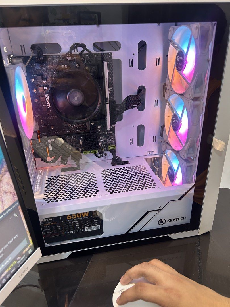 PC set lightly used PLS Check specs (Category: Desktops) located in Manila. Submitted by jillobeats (Listing ID 1467882962, Image 2). Description: - Processor: AMD Ryzen 5 5600G - Memory: 8GB RAM - Storage: 512GB SSD - Display & Peripherals: Viewpoint monitor, white keyboard, and mouse included - Case & Power Supply: Keytech casing with Inplay GS650 PSU - Condition: Fully working, smooth performance for daily tasks and basic gaming - Extras: Stor