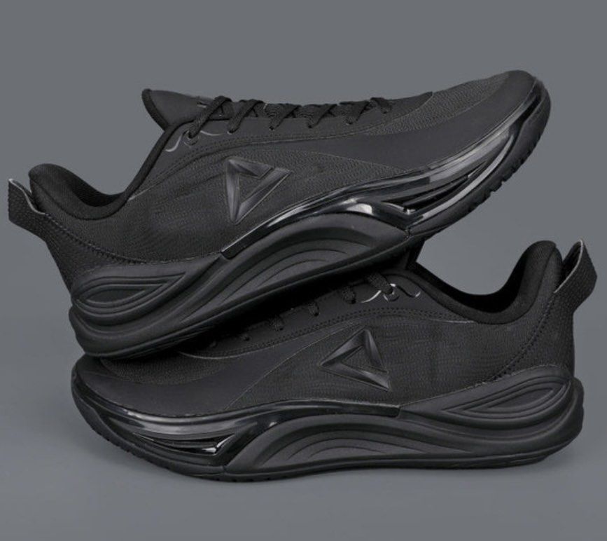 Peak Black Athletic Sneakers (Category: Sneakers) located in Manila. Submitted by lizy_dms (Listing ID 1467930275, Image 1). Description: - Brand: Peak - Style: Low-top sneakers - Color: All black - Upper: Fabric with reinforced overlays for durability - Sole: Cushioned midsole with curved lines and textured grip rubber outsole - Design Details: Signature triangular logo on the side - Convenience: Padded collar and heel pull tab for easy wear - C