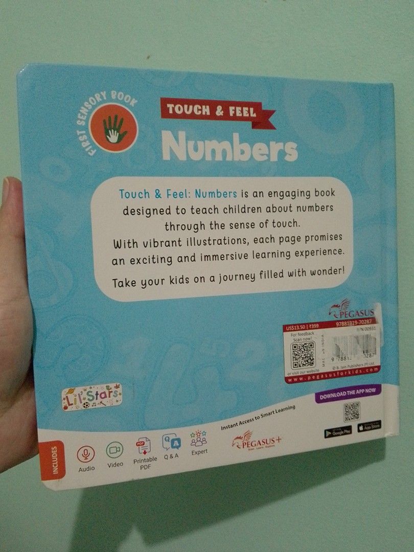 Pegasus Touch & Feel Numbers Sensory Book (Category: Children's Books) located in Ligao. Submitted by zeeyans_nook (Listing ID 1467923369, Image 2). Description: - Title: Pegasus Touch & Feel Numbers Sensory Book - Format: Sturdy board book with a bright blue cover - Features: Interactive tactile numbers on every page for hands-on learning - Visuals: Colorful animal illustrations and fun facts to keep kids engaged - Bonus: Includes a free app acc