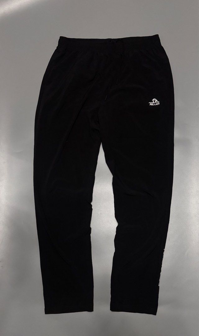 Pelliot Training Storm Dry Black Pants XL (Category: Joggers) located in Alaminos. Submitted by outfitcheck.ph (Listing ID 1467942408, Image 1). Description: - Brand: Pelliot Training - Color: Black - Size: XL (180/84A) - Material: Lightweight Storm Dry technology - Waistband: Elastic with branded drawstring - Design: Small wave logo on left hip and PELLIOT Training lettering on lower leg - Best for: Workouts and running.