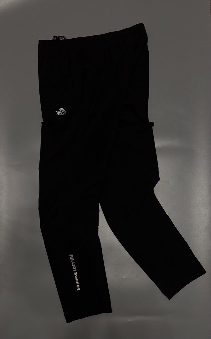 Pelliot Training Storm Dry Black Pants XL (Category: Joggers) located in Alaminos. Submitted by outfitcheck.ph (Listing ID 1467942408, Image 2). Description: - Brand: Pelliot Training - Color: Black - Size: XL (180/84A) - Material: Lightweight Storm Dry technology - Waistband: Elastic with branded drawstring - Design: Small wave logo on left hip and PELLIOT Training lettering on lower leg - Best for: Workouts and running.