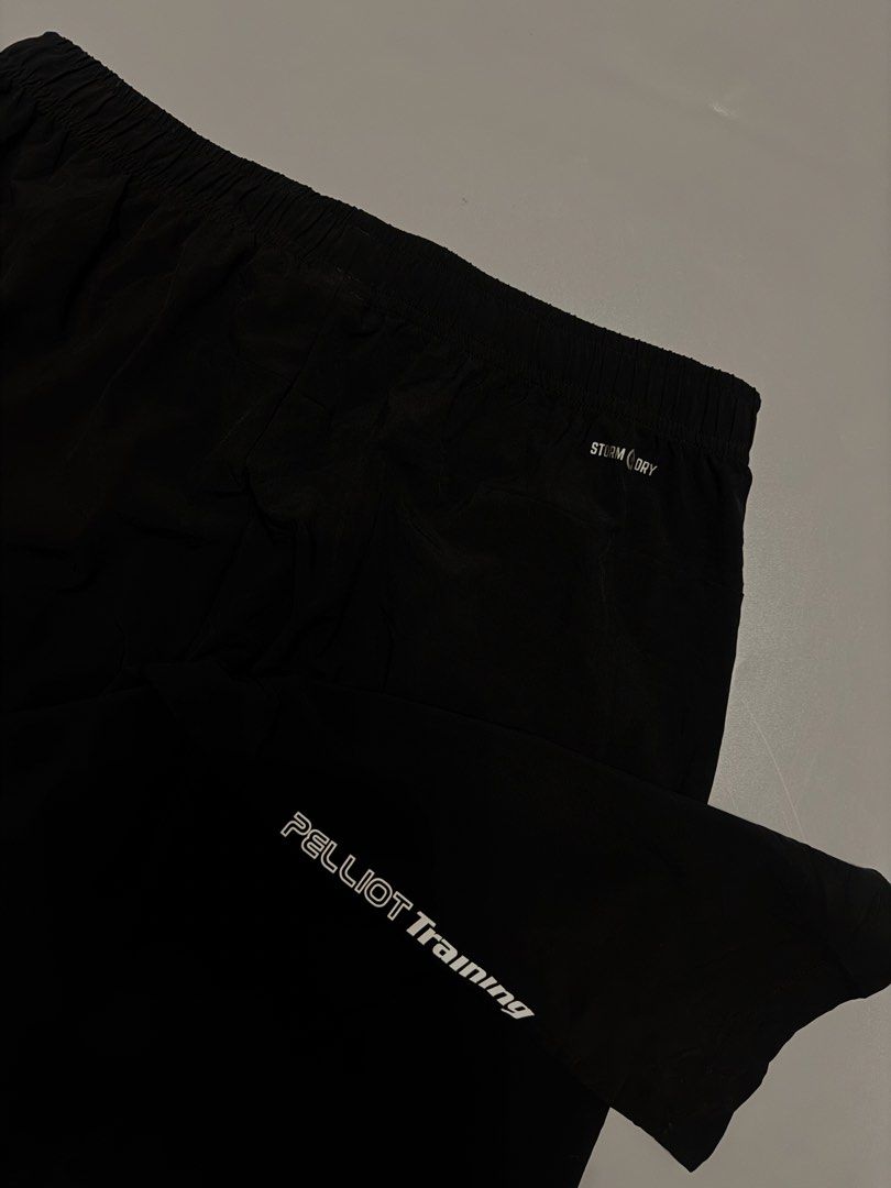 Pelliot Training Storm Dry Black Pants XL (Category: Joggers) located in Alaminos. Submitted by outfitcheck.ph (Listing ID 1467942408, Image 3). Description: - Brand: Pelliot Training - Color: Black - Size: XL (180/84A) - Material: Lightweight Storm Dry technology - Waistband: Elastic with branded drawstring - Design: Small wave logo on left hip and PELLIOT Training lettering on lower leg - Best for: Workouts and running.