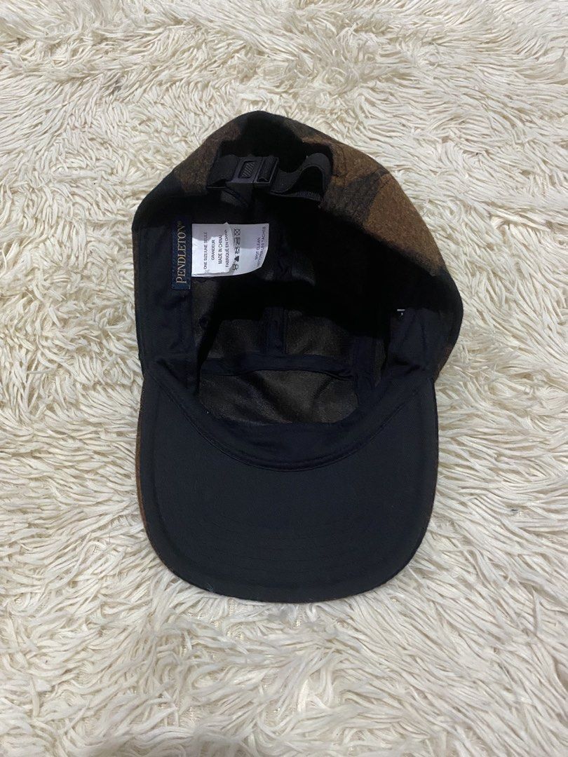 Pendleton Buffalo Check Camp Cap Brown Black (Category: Caps & Hats) located in Manila. Submitted by switchcity (Listing ID 1467878059, Image 2). Description: - Brand: Pendleton - Style: 5-panel camp hat with flat brim - Pattern: Brown and black buffalo check - Fit: Adjustable strapback with plastic buckle (One Size) - Care: Spot clean only - Origin: Made in China.