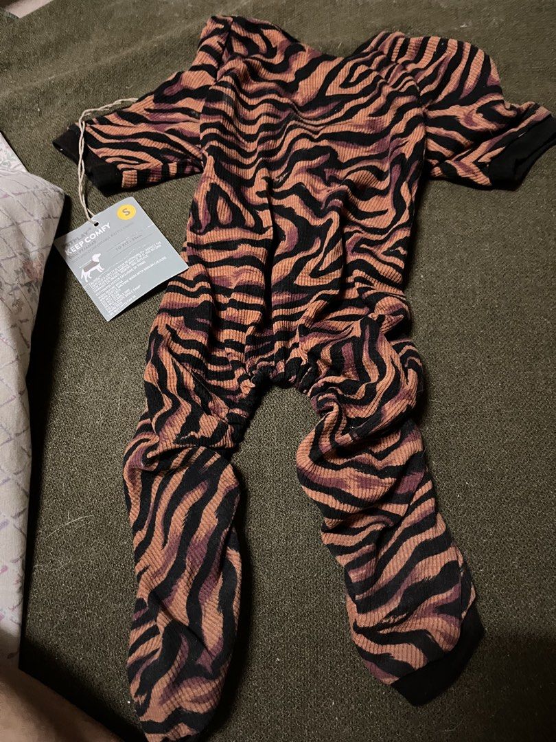 Petplay Keep Comfy Dog Pyjamas Size S Tiger Print (Category: Health & Grooming) located in Los Banos. Submitted by profemy (Listing ID 1467896766, Image 2). Description: Petplay Keep Comfy dog pyjamas in a fun tiger print design. Soft waffle fabric, super cozy for bedtime. Size S, designed to fit 35cm. Cotton and polyester blend. Brand new with tags attached. Add 75 pesos for shipping by J&T..