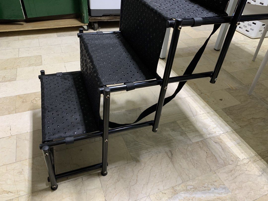 Petsafe Foldable 4-Step Portable Pet Stairs Black with Paw Print Pattern (Category: Ladders & Steps) located in Paranaque City. Submitted by seb_trading (Listing ID 1467926177, Image 3). Description: - Color: Sleek black with cute paw print pattern on treads - Ideal For: Small dogs and cats, especially senior pets needing help reaching beds or couches - Sturdy Design: Durable metal frame with comfortable foam/fabric steps - Convenient Features: P