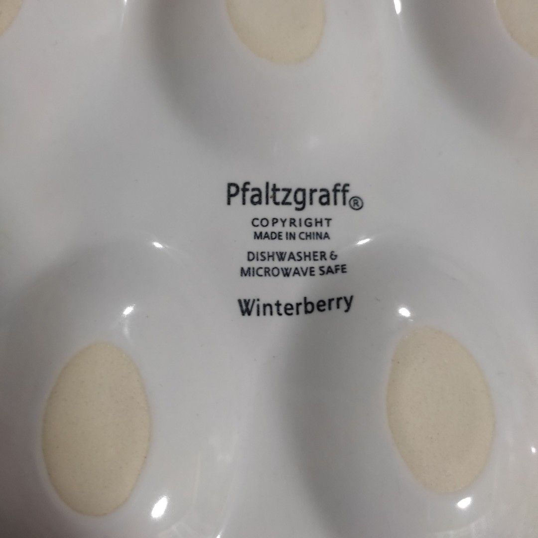 Pfaltzgraff Winterberry Christmas Tree Egg Tray Platter (2 Pcs) (Category: Dinnerware & Cutlery) located in Las Pinas. Submitted by lawki_stuff (Listing ID 1467852006, Image 3). Description: Pfaltzgraff Winterberry Deviled Egg Plate Shaped like Cristmas Tree & decorated with holly, mistletoe & a large red bow at the top Serving dish for 12 egg placement Safe for the dishwasher & microwave Crafted from durable earthware or stoneware Size 12"x10" V